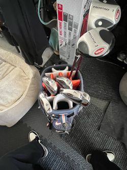 Wilson golf clubs and Nike bag LH