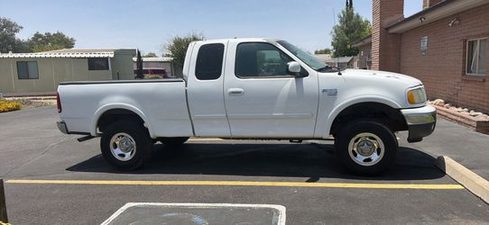 Ford-f-150  v8 5.4L triton 4x4  año 1(contact info removed)00 millas