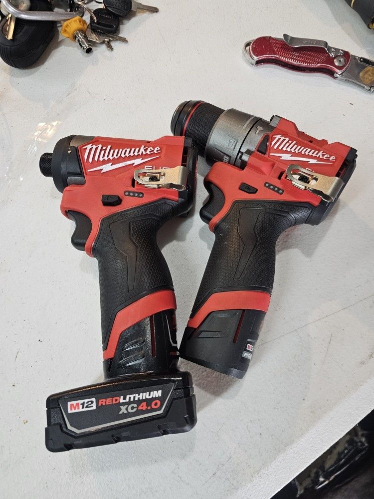 Milwaukee M12 FUEL 12-Volt Lithium-Ion Brushless Cordless Hammer Drill and Impact Driver Combo Kit w/2 Batteries and Bag (2-Tool)
