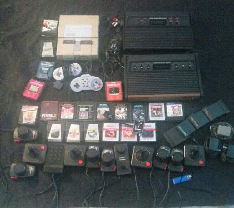 Super nintendo and atari 2600 consoles xbox kinects 24 atari games xbox game 12 controller everything except super nintendo power cord