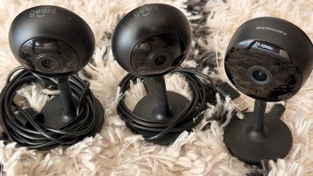 Two Geeni Look 1080p Indoor Security Camera and One Merkury Innovations Smart WiFi HD 1080p Camera