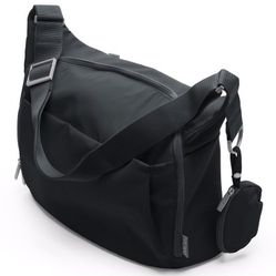 Stokke Changing Bag in Excellent Condition, Black, was worn only 2 times while traveling
