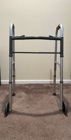 Walker: Unused, lightweight & collapsible.