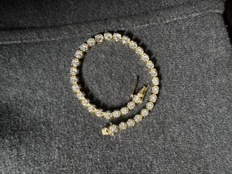 gold tennis bracelet