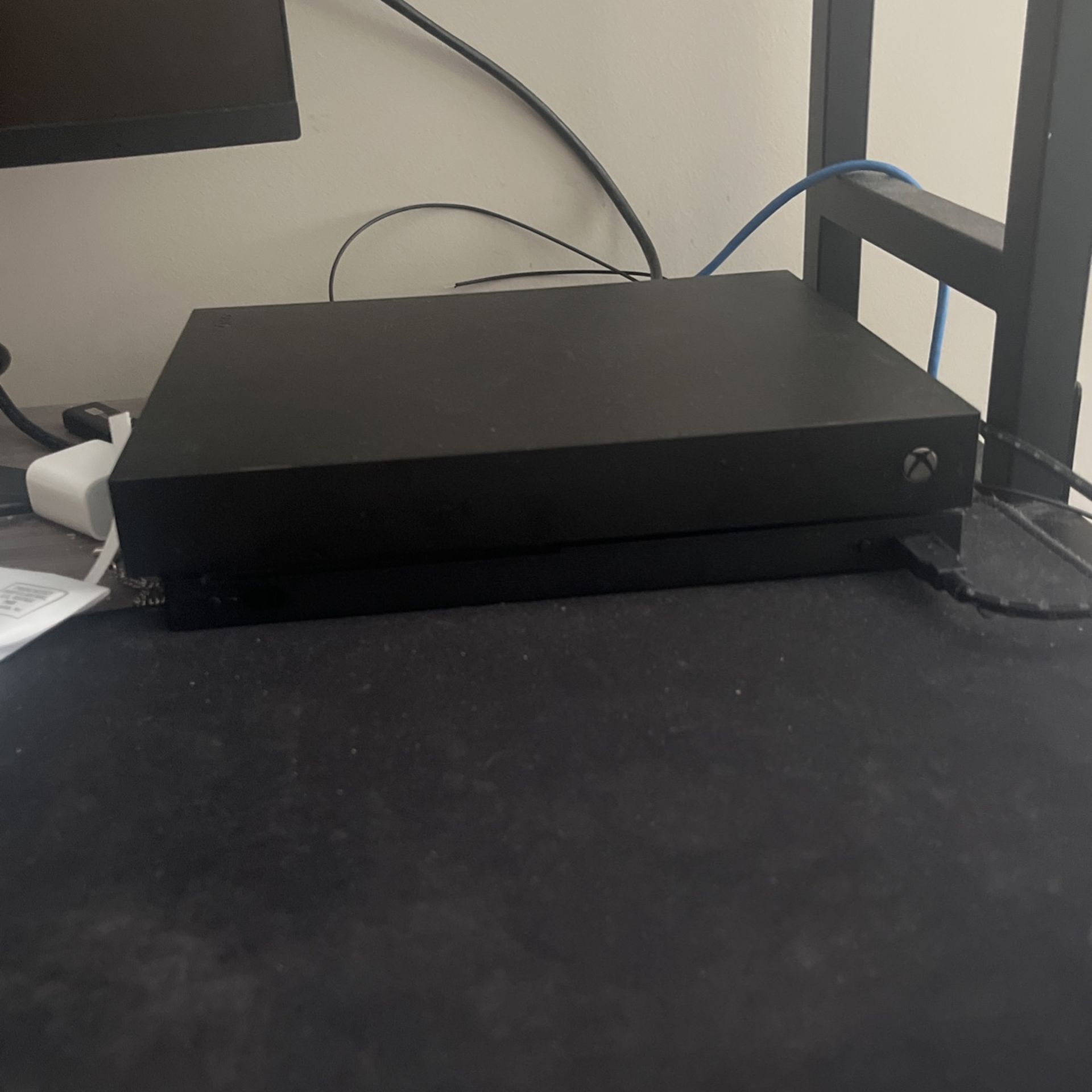Xbox One X with games installed