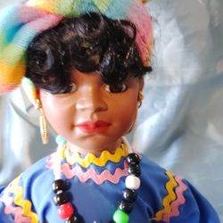 new African trans World collection Porcelain doll 