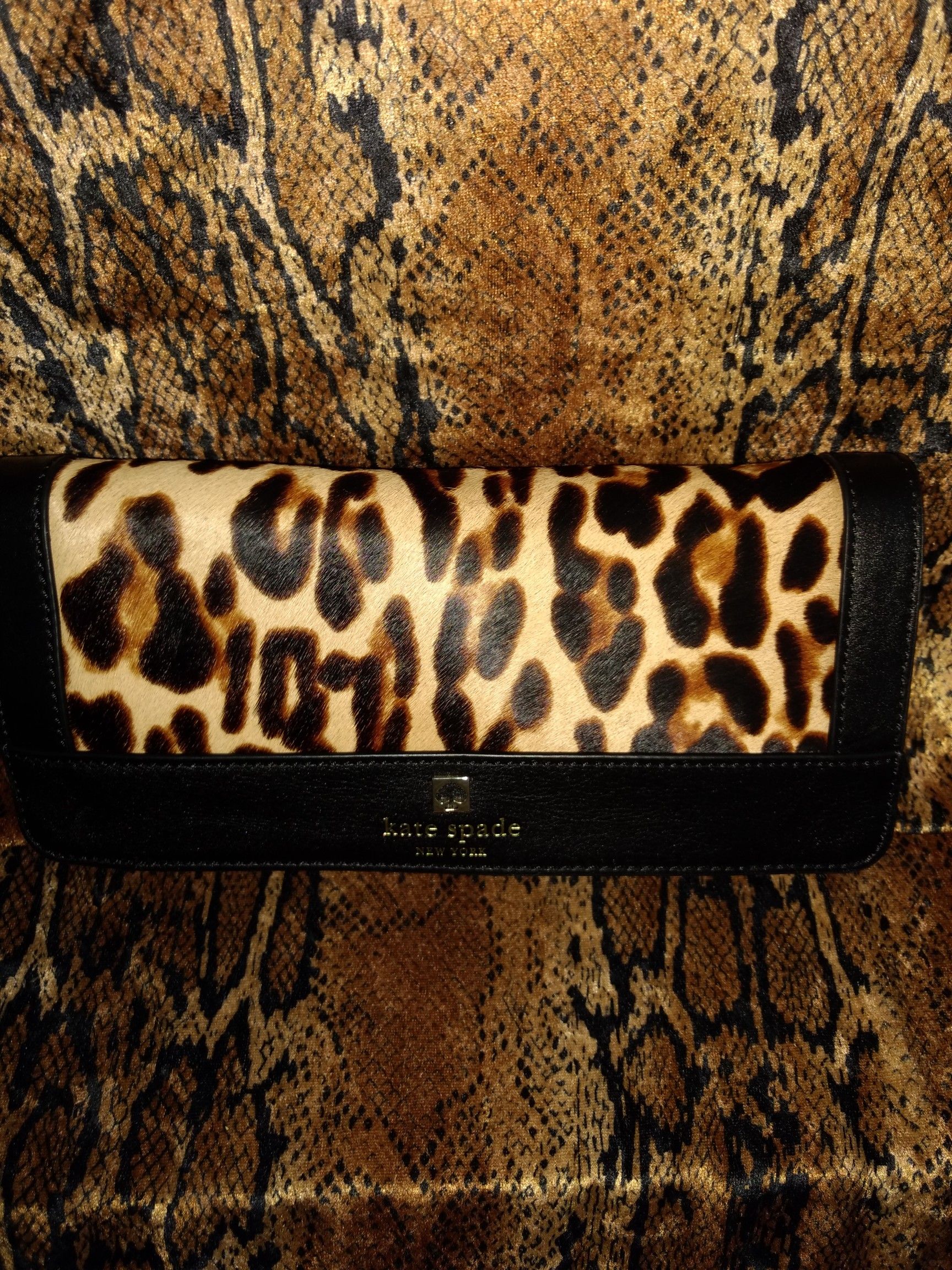 New Kate Spade Leopard print leather clutch purse.