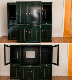Elegant emerald green and gold entertainment center