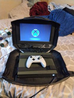 Xbox One s with TV carrying case