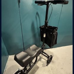 Knee scooter with storage bag