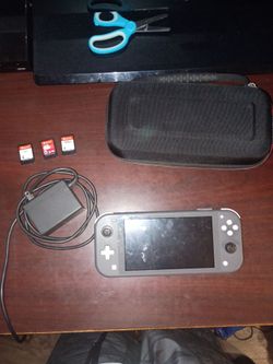 Nintendo switch case and charger with FIFA 20 Paradise city the show 26