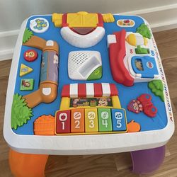 Laugh & Learn Baby to Toddler Toy, Around the Town Learning Table with Music Lights & Activities