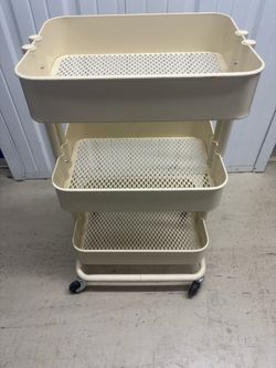 Metal cart on wheels