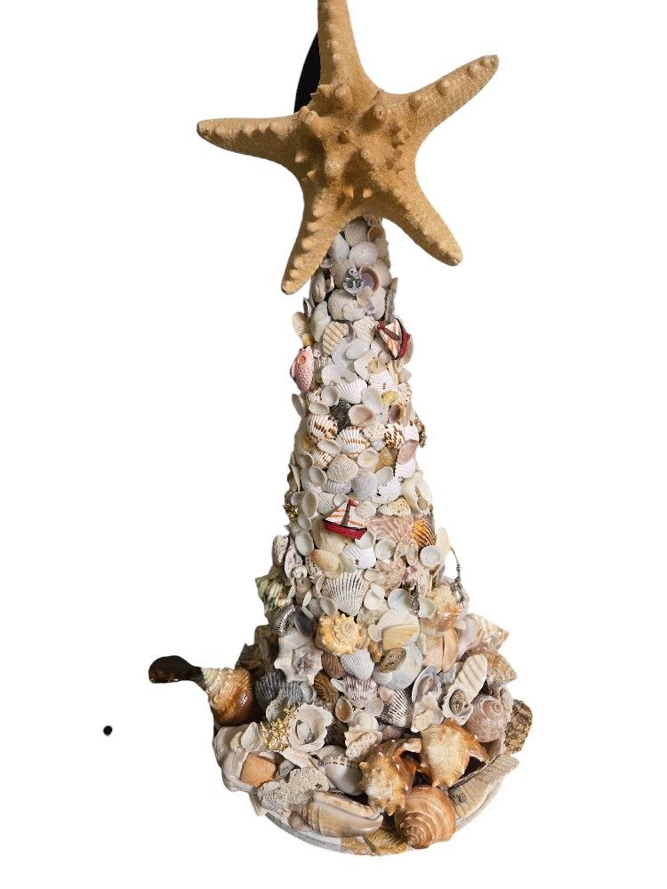 seashell handcrafted christmas tree with vintage jewelry and nautical accents