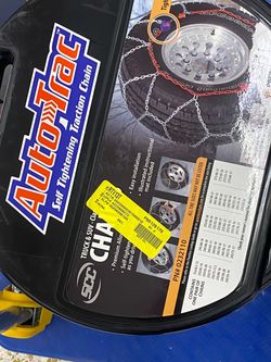Auto trac self tightening traction chain