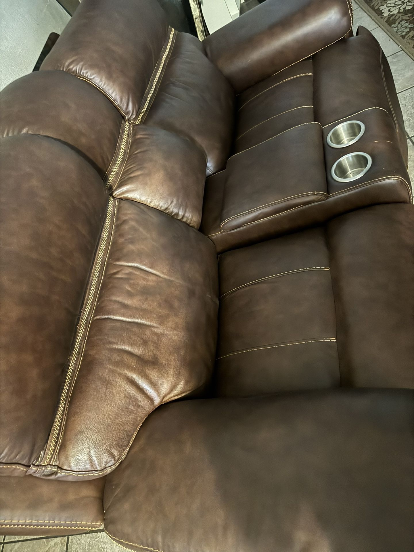 Brown Leather Reclining Sofa