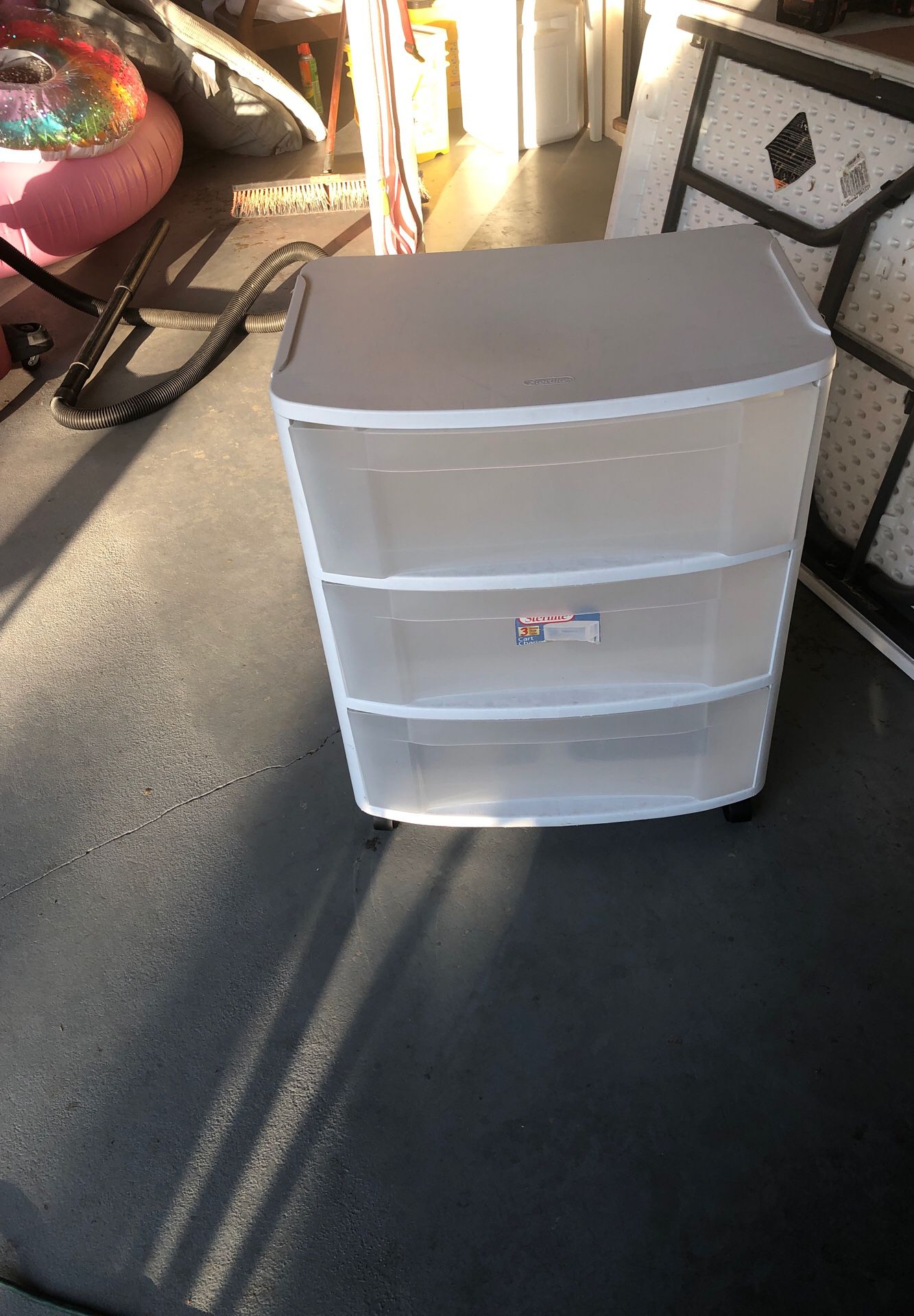 White plastic storage bin