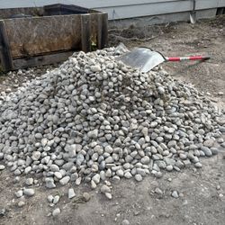 Free drainage gravel. Two piles available, same as in the photo.
