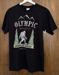 Port & Company men’s Olympic National Park Home of Bigfoot black 100% cotton graphic tee, size M