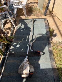 STIHL Brushcutter with metal 3-tooth brush cutter blade