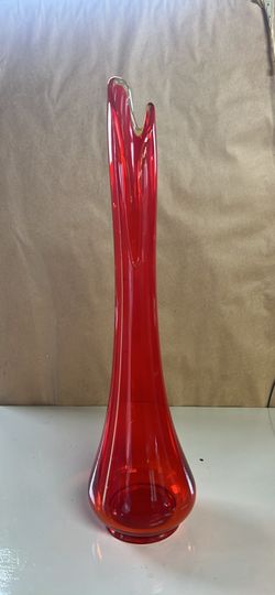 This item is a vintage L.E. Smith red glass swung vase, a popular piece of Mid-Century Modern art glass