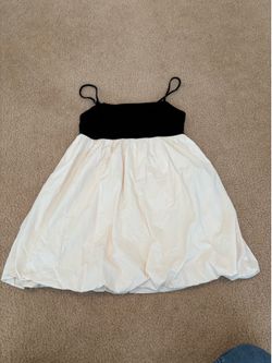 White and black womens dress