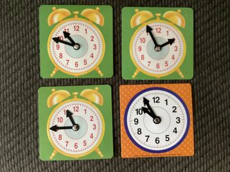 Four Cardboard Classroom Clocks