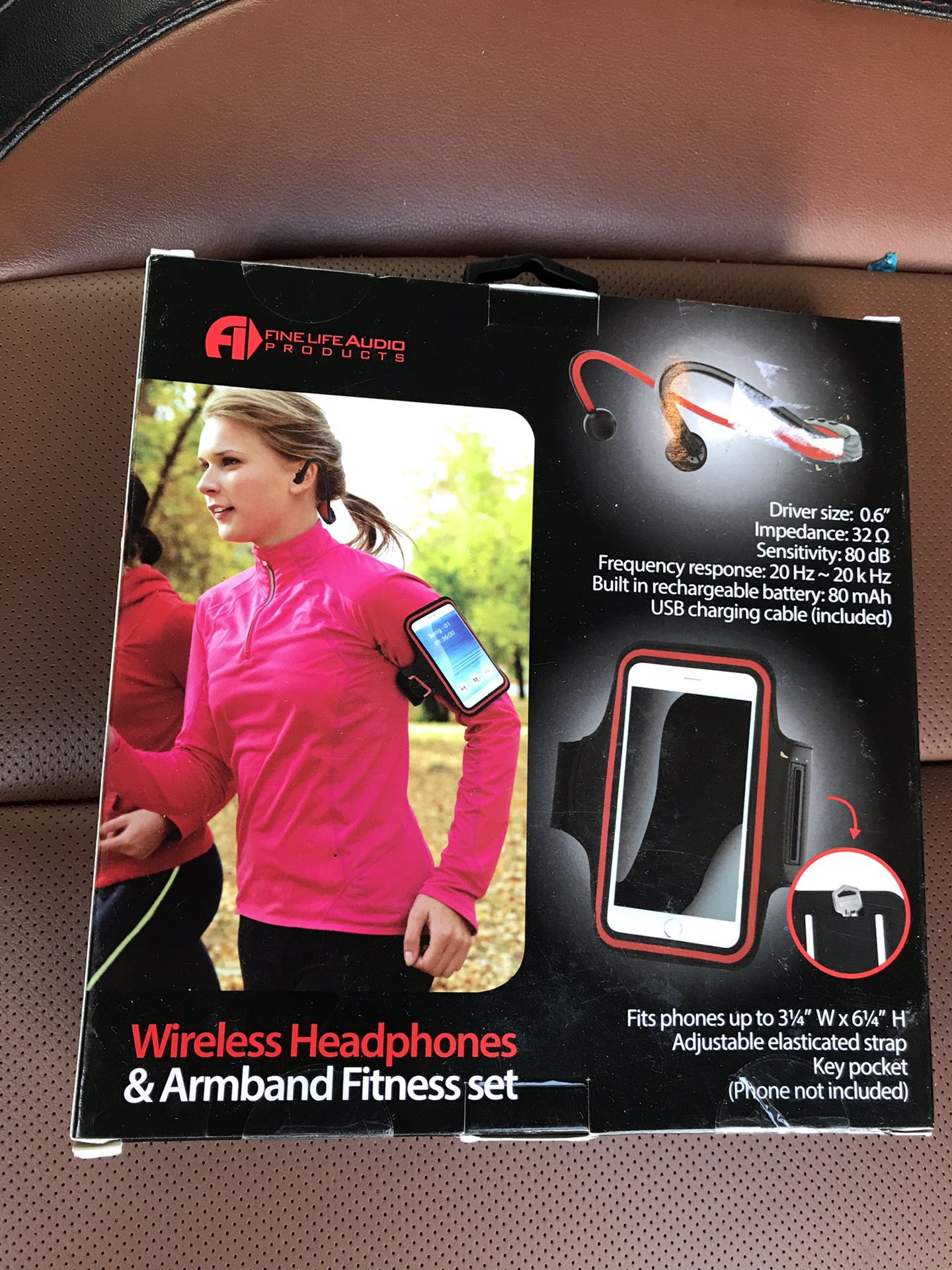 Brand new wireless headphones and armband. 2 in 1