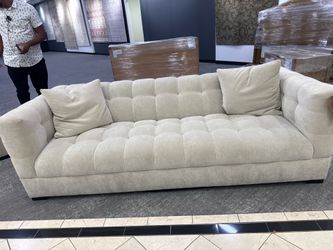 beautiful tufted sofa sand color