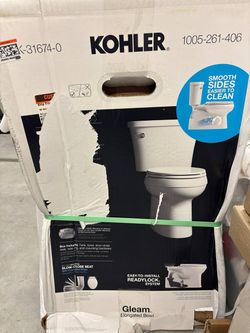 Kohler Gleam 12 in. Rough In 2-Piece 1.28 GFP Single Flush Elongated Chair Height Toilet in White with Soft Close Seat