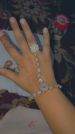 Beautiful bracelet with ring attached to it 💫