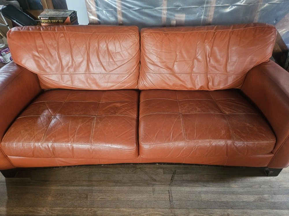 Orange Leather Couch and Chair With Ottoman