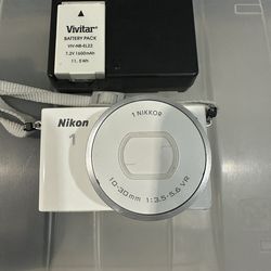 Nikon 1 Mirrorless Camera – 10–30mm VR Lens + Battery & Charger