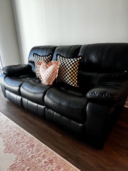 Black leather reclining sofa