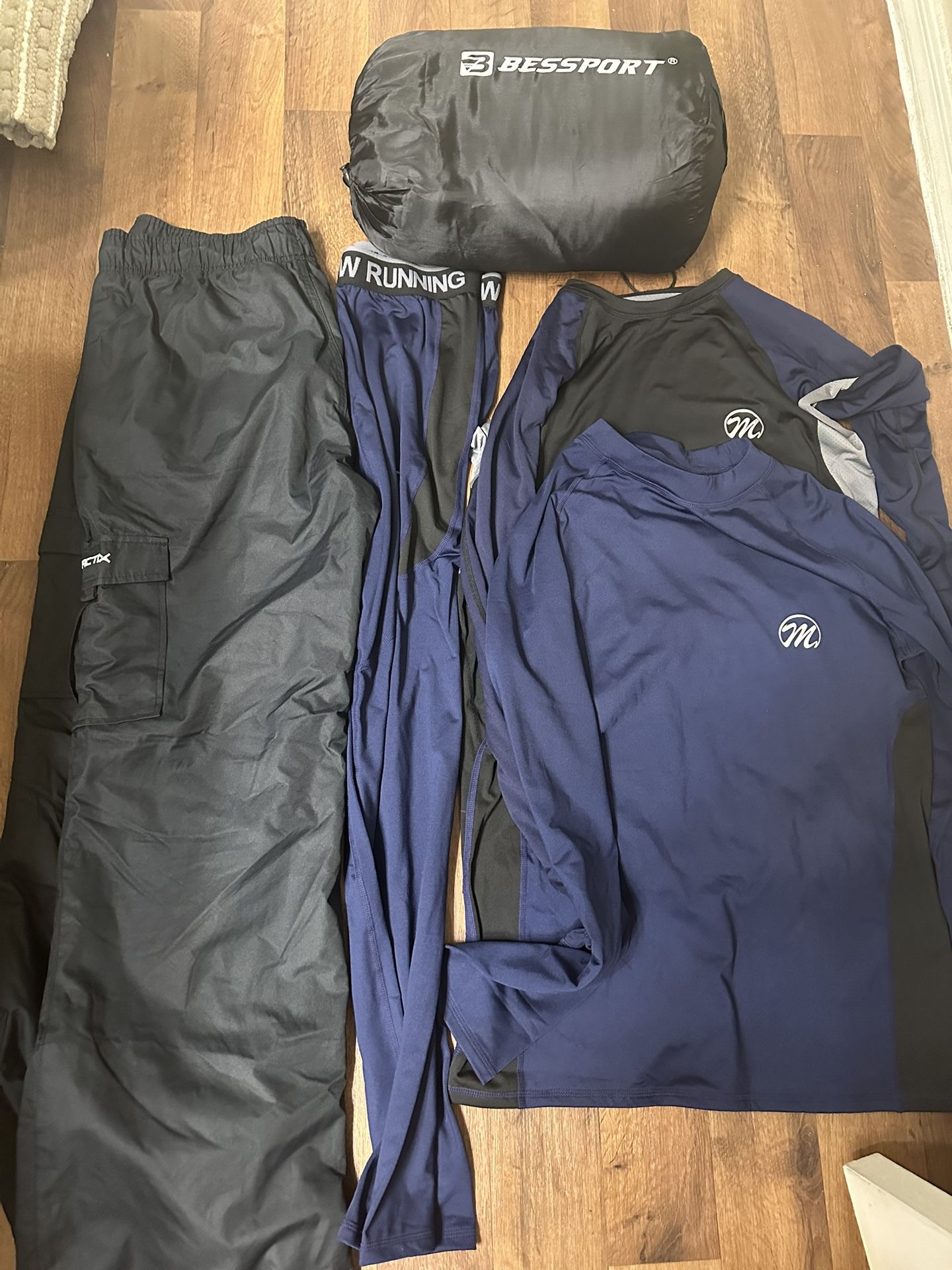 Camping hiking survival sleeping bag and thermal clothing kit