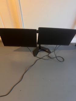 24 inch Dual Dell monitors with stand arm