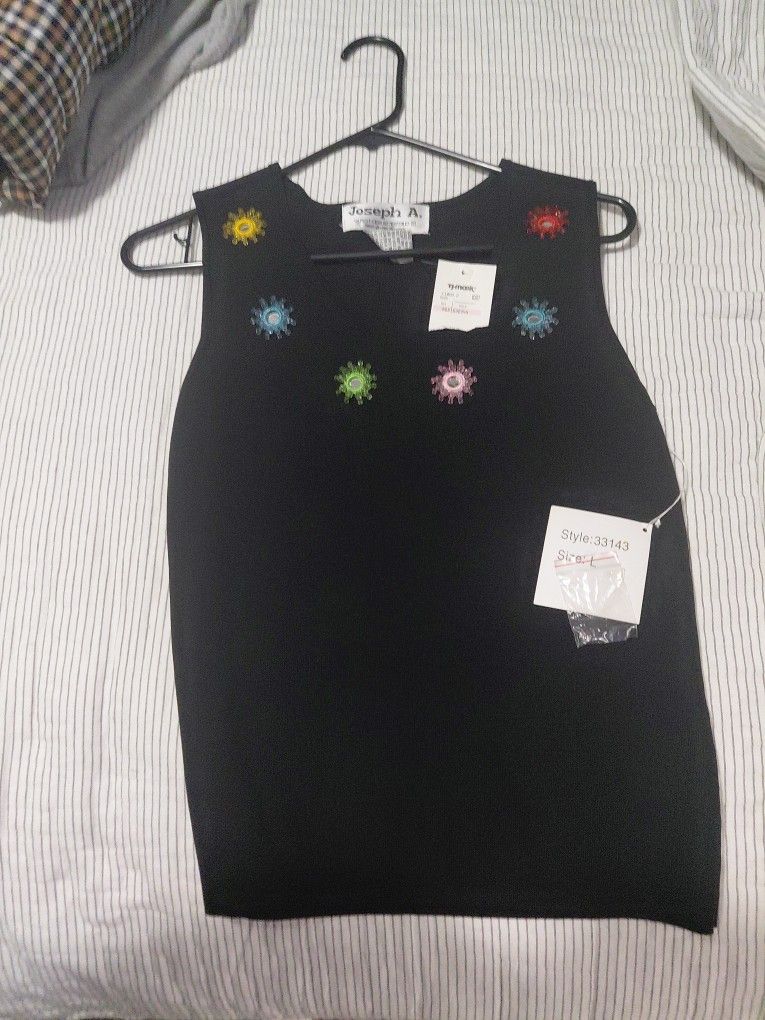 Womans Lrg. Shirt With Colored Pieces On Front