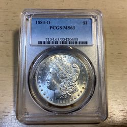 Graded 1884 O Morgan Silver Dollar 