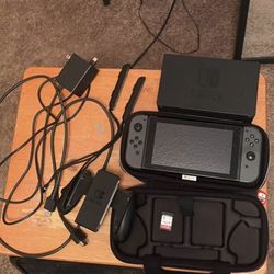 Nintendo Switch with case and accessories plus one game