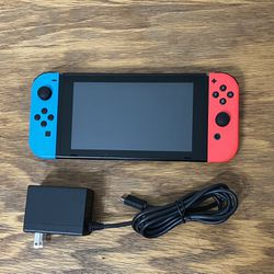 Nintendo Switch video game console system + AC Charging cable Neon Red blue joycon joycons