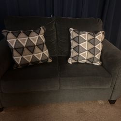 Loveseat With Two pillows 