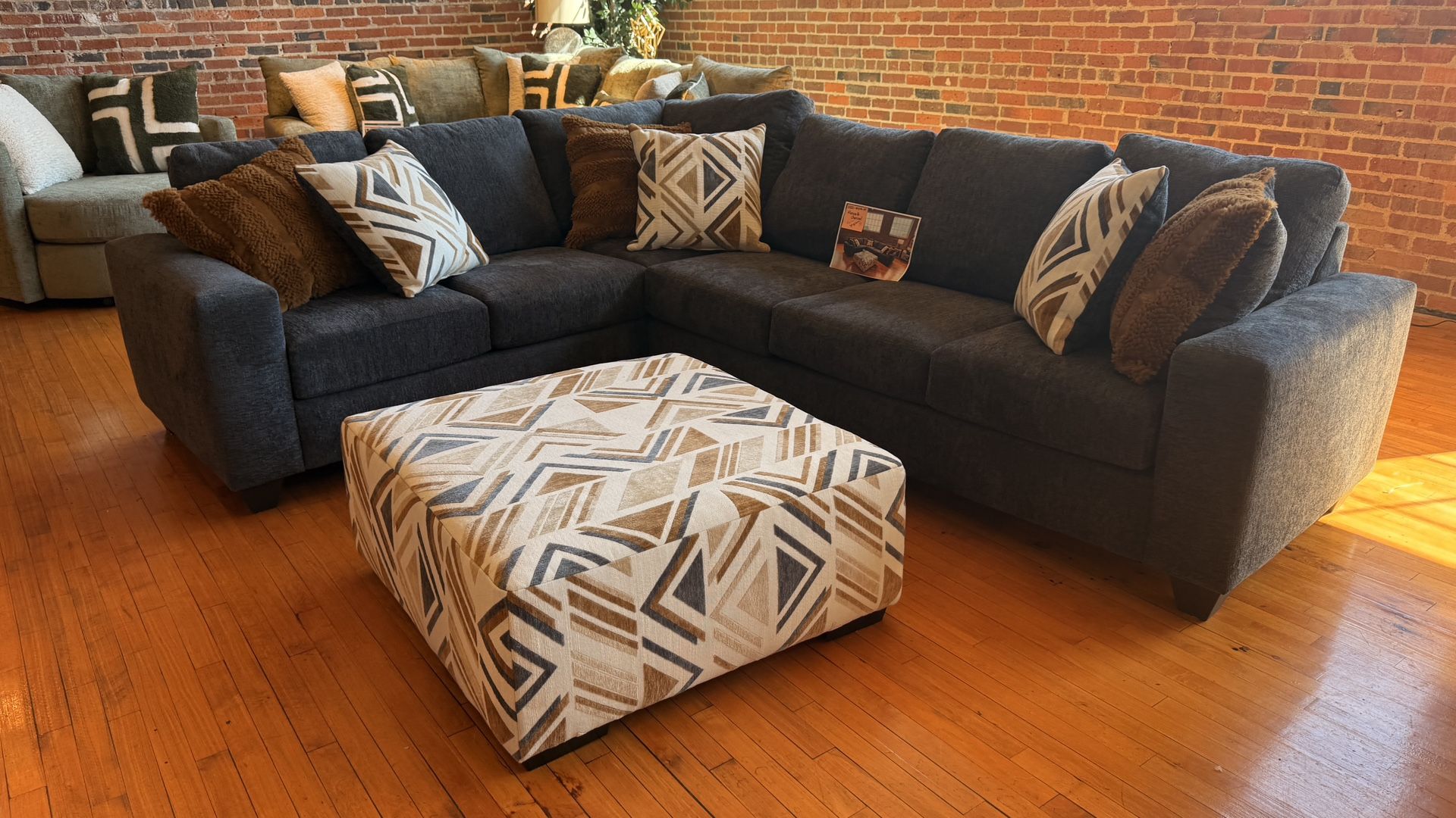 New Marquette 2 pc sectional sofa with ottoman and pillow by Albany