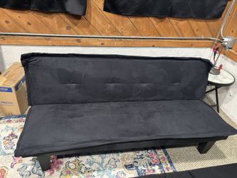 2 Black Futons With Cushioned Covers