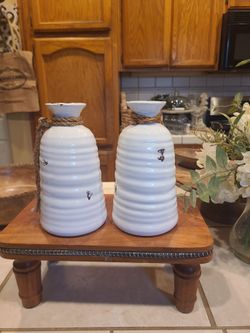 Two small farmhouse vases. One has a chip. Hobby Lobby