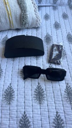 PRADA GLASSES