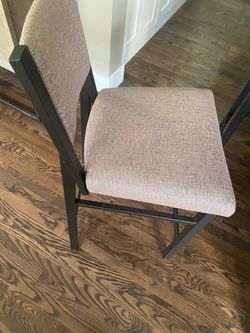 High-quality high-end counter chairs, four chairs total. Back is 40 inches high and seats are 18 inches across.