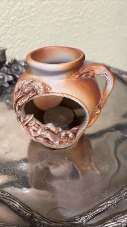 Swagman pottery, sleeping man dog votive candle holder burner