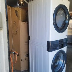 NEW ELECTROLUX TOWER WASHER AND ELECTRIC DRYER 