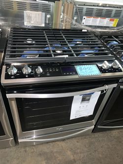 Brand new WHIRLPOOL slide-in gas range with 6 months warranty