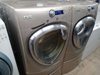 GE Profile tan front load washer and dryer set on pedestals - Free delivery